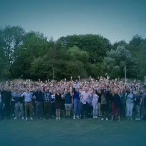 Image of all WTC people waving - About Us page