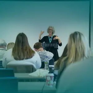 Image from back of classroom, Lucy Peppiatt teaching - Study with us page