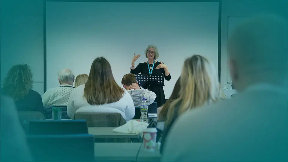 Image from back of classroom, Lucy Peppiatt teaching - Study with us page