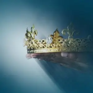 Image of crown held in hands with lightrays - Kingdom Theology page